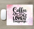 Mouse pad with 'Coffee is my love language' text on a watercolor background
