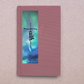 Pink book with 'faith' on a colorful abstract background