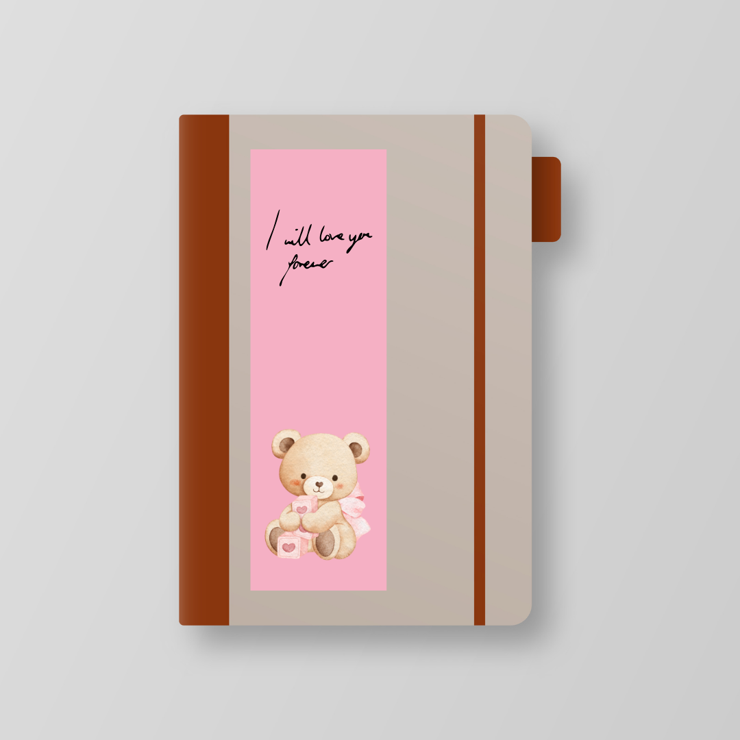 Notebook with teddy bear illustration and pink ribbon on a gray background