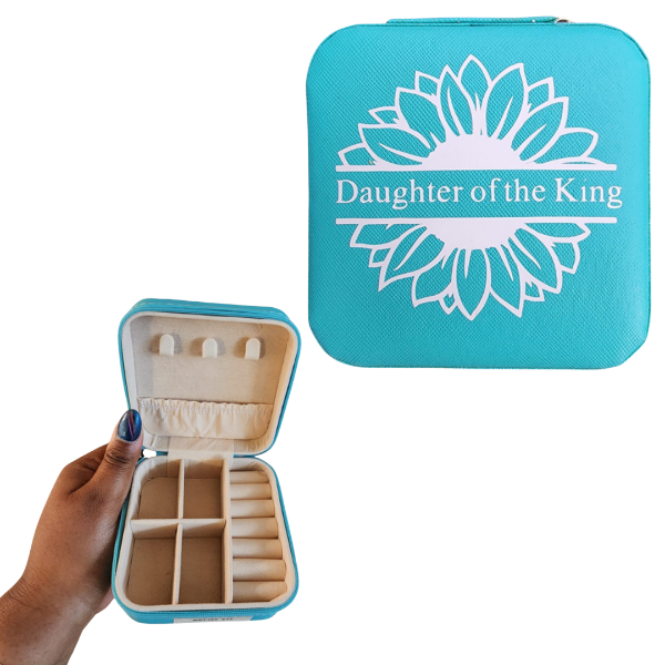 Turquoise jewelry case with 'Daughter of the King' design on a white background